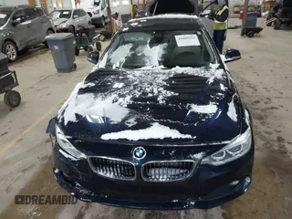 2015 BMW 4 Series 428i xDrive with VIN WBA4A7C57FD414955, listed as a IAAI auction lot 41609214 with 69,125 mi miles and . Bid and sale history available at DreamBid. Image 12.