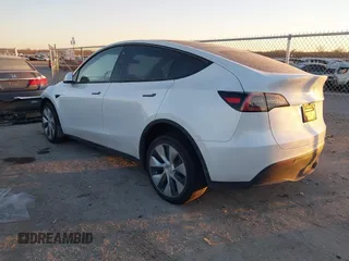 2023 Tesla Model Y Long Range z VIN 7SAYGDEE6PA061228, wystawiony jako IAAI lot #41371547 z przebiegiem 25 121 mil mil oraz . Historia ofert i sprzedaży dostępna na DreamBid. Obrazek 3.