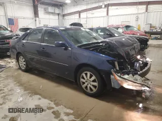 2003 Toyota Camry LE z VIN 4T1BF30K23U058761, wystawiony jako Copart lot #51286985 z przebiegiem 90 143 mil mil oraz Nie do naprawy • Non repairable. Historia ofert i sprzedaży dostępna na DreamBid. Obrazek 4.
