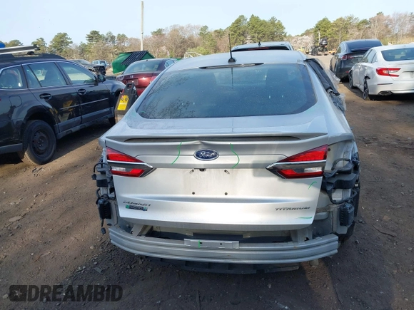 2019 Ford Fusion Titanium with VIN 3FA6P0SU8KR212370, listed as a IAAI auction lot 42114934 with 42,521 mi miles and . Bid and sale history available at DreamBid. Image 16.