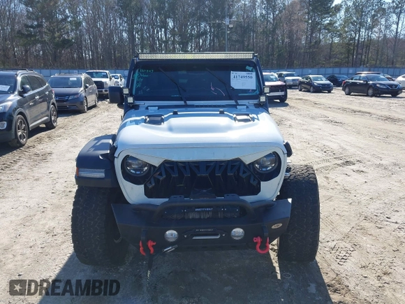 2022 Jeep Wrangler Unlimited Rubicon z VIN 1C4JJXFGXNW121489, wystawiony jako IAAI lot #41749550 z przebiegiem 56 601 mil mil oraz . Historia ofert i sprzedaży dostępna na DreamBid. Obrazek 13.