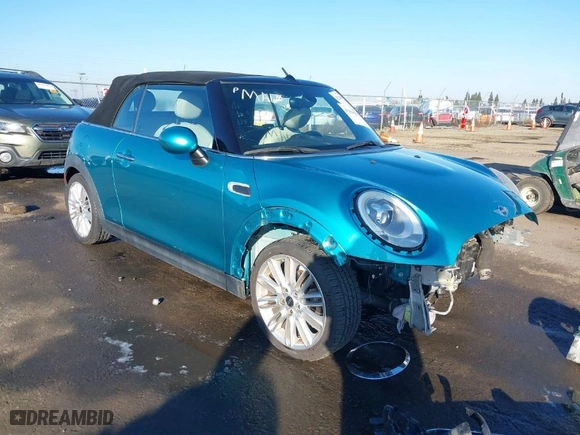 2016 MINI Cooper Convertible with VIN WMWWG5C50G3C19656, listed as a IAAI auction lot 41429611 with 60,873 mi miles. Bid and sale history available at carsss.com. Image 1.