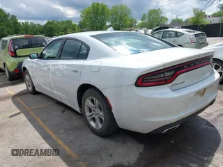 2023 Dodge Charger SXT with VIN 2C3CDXBG3PH518747, listed as a IAAI auction lot 42174270 with 51,956 mi miles. Bid and sale history available at carsss.com. Image 3.
