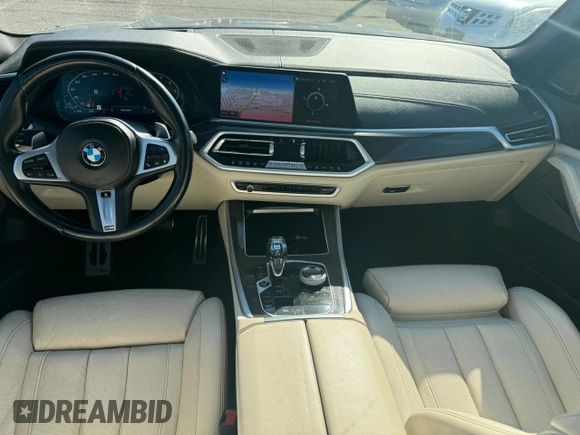 2021 BMW X5 M50i with VIN 5UXJU4C00M9H36466, listed as a Copart auction lot 77444344 with 100,119 mi miles and Clean Title. Bid and sale history available at carsss.com. Image 6.