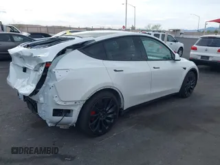 2023 Tesla Model Y Performance with VIN 7SAYGDEFXPF589477, listed as a IAAI auction lot 41936981 with 28,993 mi miles and . Bid and sale history available at DreamBid. Image 4.