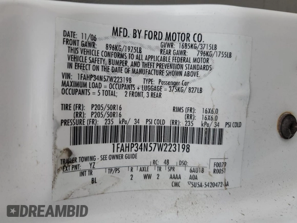2007 Ford Focus S z VIN 1FAHP34N57W223198, wystawiony jako Copart lot #55725345 z przebiegiem 174 833 mil mil oraz Szkoda całkowita • Salvage title. Historia ofert i sprzedaży dostępna na DreamBid. Obrazek 12.