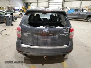 2014 Subaru Forester with VIN JF2SJHLC8EH492751, listed as a Copart auction lot 85634954 with 176,328 mi miles and Salvage title. Bid and sale history available at DreamBid. Image 6.