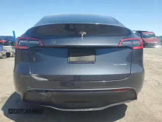 2021 Tesla Model Y Long Range z VIN 5YJYGDEE6MF074492, wystawiony jako Copart lot #54960655 z przebiegiem 57 468 mil mil oraz Szkody całkowita. Historia ofert i sprzedaży dostępna na DreamBid. Obrazek 6.