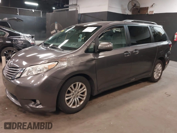 2015 Toyota Sienna XLE with VIN 5TDYK3DC3FS677780, listed as a IAAI auction lot 42155459 with 102,355 mi miles. Bid and sale history available at carsss.com. Image 17.