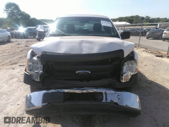 2014 Ford F-150 XL with VIN 1FTMF1CM0EKG51659, listed as a IAAI auction lot 42502648 with 99,450 mi miles and . Bid and sale history available at DreamBid. Image 12.