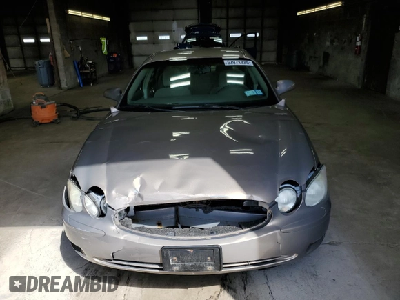2007 Buick LaCrosse CX with VIN 2G4WC582171176392, listed as a Copart auction lot 52071725 with 114,476 mi miles and Salvage title. Bid and sale history available at DreamBid. Image 5.