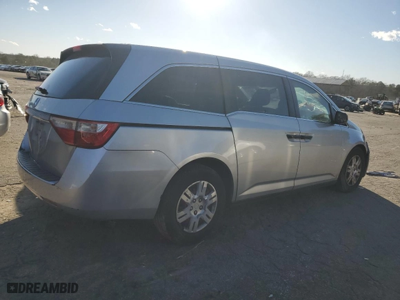 2012 Honda Odyssey LX with VIN 5FNRL5H26CB019627, listed as a Copart auction lot 87094684 with 214,563 mi miles and Salvage Title. Bid and sale history available at carsss.com. Image 3.