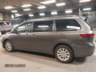 2015 Toyota Sienna XLE with VIN 5TDYK3DC3FS677780, listed as a IAAI auction lot 42155459 with 102,355 mi miles. Bid and sale history available at carsss.com. Image 14.
