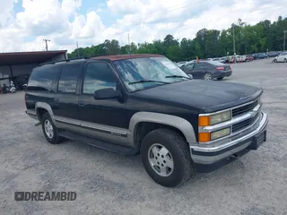 1999 Chevrolet Suburban z VIN 1GNFK16R7XJ539971, wystawiony jako IAAI lot #42189581 z przebiegiem 382 342 mil mil oraz . Historia ofert i sprzedaży dostępna na DreamBid. Obrazek 1.