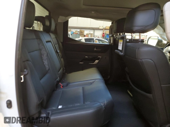 2023 Toyota Tundra Limited Hybrid with VIN 5TFJC5DB5PX015177, listed as a Copart auction lot 87896795 with 77,113 mi miles and Salvage title. Bid and sale history available at DreamBid. Image 10.