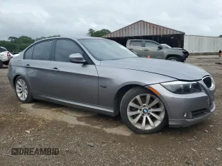 2011 BMW 3 Series 328i with VIN WBAPH5C54BA445749, listed as a Copart auction lot 55061135 with 124,159 mi miles and Salvage title. Bid and sale history available at DreamBid. Image 4.