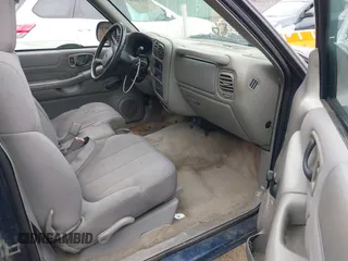 2003 GMC Sonoma SLS with VIN 1GTCS14H138228849, listed as a IAAI auction lot 41541363 with 217,969 mi miles. Bid and sale history available at carsss.com. Image 5.
