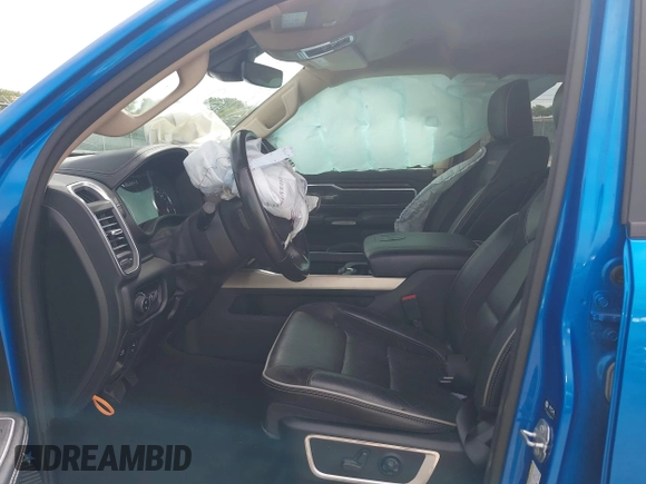 2021 Ram 1500 Laramie with VIN 1C6SRFJT1MN774879, listed as a IAAI auction lot 42242318 with 51,971 mi miles and . Bid and sale history available at DreamBid. Image 5.
