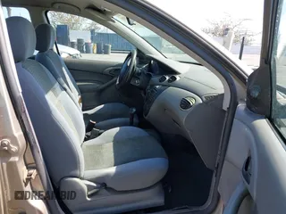 2004 Ford Focus z VIN 1FAFP33Z24W149701, wystawiony jako IAAI lot #42360188 z przebiegiem 152 415 mil mil oraz . Historia ofert i sprzedaży dostępna na DreamBid. Obrazek 5.