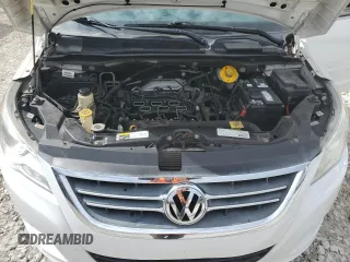2014 Volkswagen Routan SE z VIN 2C4RVABG0ER134352, wystawiony jako Copart lot #58467235 z przebiegiem 161 822 mil mil oraz Czysty tytuł • Clean title. Historia ofert i sprzedaży dostępna na DreamBid. Obrazek 12.