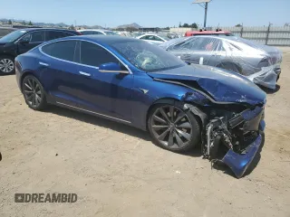 2018 Tesla Model S 75D with VIN 5YJSA1E25JF249743, listed as a Copart auction lot 59636235 with 101,275 mi miles and Salvage title. Bid and sale history available at DreamBid. Image 4.