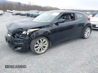 2012 Hyundai Veloster w/Gray Int z VIN KMHTC6AD6CU054422, wystawiony jako IAAI lot #41930634 z przebiegiem 144 681 mil mil oraz . Historia ofert i sprzedaży dostępna na DreamBid. Obrazek 18.