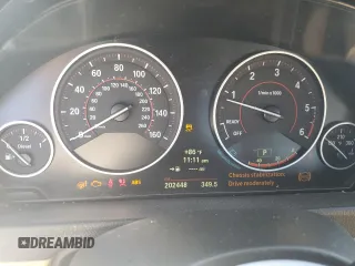 2014 BMW 3 Series 328d xDrive with VIN WBA3K5C56EKT33677, listed as a Copart auction lot 70003954 with 202,448 mi miles and Salvage title. Bid and sale history available at DreamBid. Image 9.