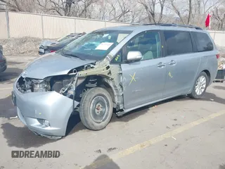 2015 Toyota Sienna XLE with VIN 5TDYK3DC2FS640204, listed as a IAAI auction lot 41772349 with 104,156 mi miles. Bid and sale history available at carsss.com. Image 2.