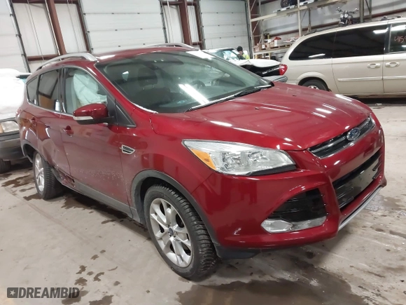 2014 Ford Escape Titanium with VIN 1FMCU9J9XEUA51732, listed as a IAAI auction lot 41542867 with 44,141 mi miles. Bid and sale history available at carsss.com. Image 1.