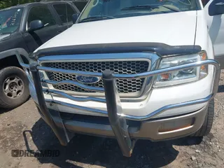 2004 Ford F-150 XLT with VIN 1FTPW12504KC34452, listed as a IAAI auction lot 42051599 with 215,857 mi miles. Bid and sale history available at carsss.com. Image 6.