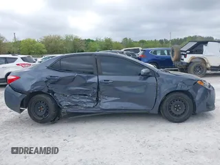 2019 Toyota Corolla L z VIN 5YFBURHE1KP947817, wystawiony jako IAAI lot #41959566 z przebiegiem 128 574 mil mil oraz . Historia ofert i sprzedaży dostępna na DreamBid. Obrazek 14.