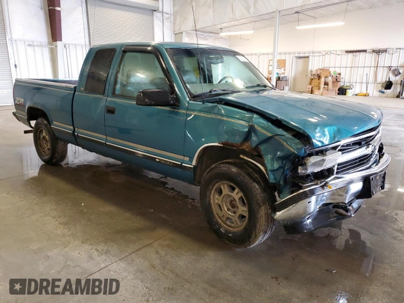 1997 Chevrolet Silverado 1500 with VIN 2GCEK19R8V1276249, listed as a Copart auction lot 52372655 with 237,612 mi miles and Salvage Title. Bid and sale history available at DreamBid. Image 4.