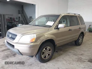 2005 Honda Pilot EX-L with VIN 5FNYF18565B019345, listed as a IAAI auction lot 41641423 with 282,099 mi miles. Bid and sale history available at carsss.com. Image 2.