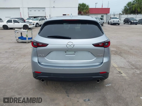 2023 Mazda CX-5 S Carbon Edition z VIN JM3KFBCM3P0197796, wystawiony jako IAAI lot #42408301 z przebiegiem 46 169 mil mil oraz . Historia ofert i sprzedaży dostępna na DreamBid. Obrazek 16.