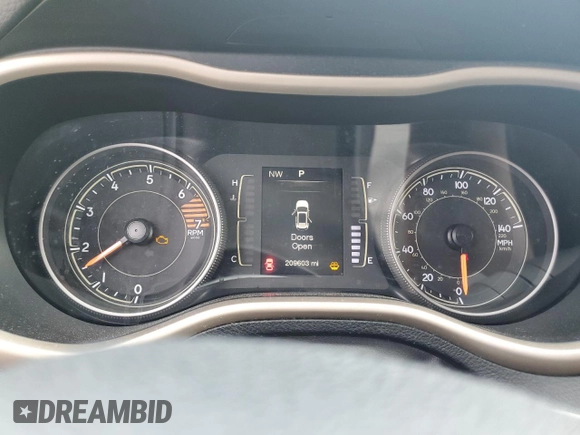 2016 Jeep Cherokee 75th Anniversary with VIN 1C4PJLCB0GW342839, listed as a Copart auction lot 54729545 with 209,603 mi miles and Salvage Title. Bid and sale history available at DreamBid. Image 9.