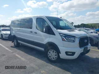 2023 Ford Transit Passenger XL with VIN 1FBAX2YG6PKB08879, listed as a IAAI auction lot 42137671 with 44,204 mi miles. Bid and sale history available at carsss.com. Image 1.
