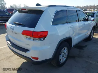 2014 Jeep Grand Cherokee Laredo with VIN 1C4RJEAGXEC130399, listed as a IAAI auction lot 41861664 with 106,925 mi miles. Bid and sale history available at carsss.com. Image 4.