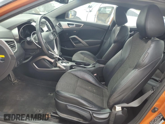2013 Hyundai Veloster w/Black Int with VIN KMHTC6ADXDU121105, listed as a Copart auction lot 55171015 with 130,905 mi miles and Salvage title. Bid and sale history available at DreamBid. Image 7.