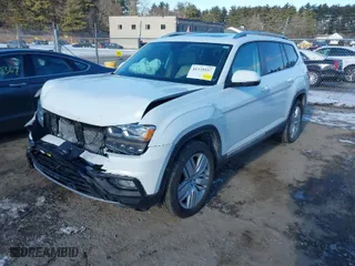 2019 Volkswagen Atlas 3.6L V6 SEL with VIN 1V2MR2CA5KC553296, listed as a IAAI auction lot 41329337 with 91,041 mi miles. Bid and sale history available at carsss.com. Image 2.