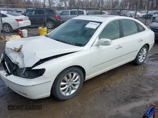 2007 Hyundai Azera SE z VIN KMHFC46F57A178118, wystawiony jako IAAI lot #41653806 z przebiegiem 104 221 mil mil oraz . Historia ofert i sprzedaży dostępna na DreamBid. Obrazek 2.