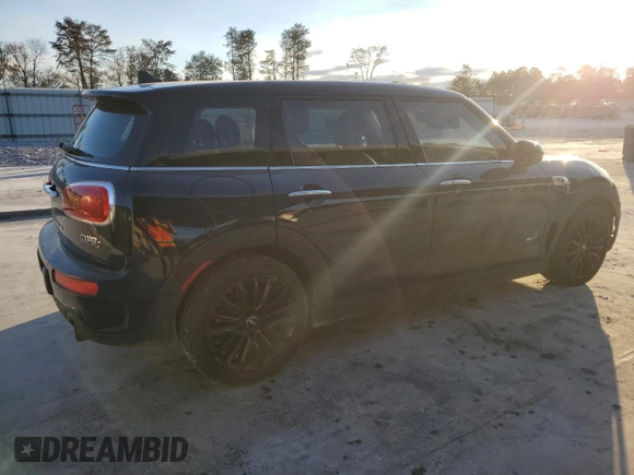 2017 MINI Clubman Cooper S with VIN WMWLU5C56H2E82110, listed as a Copart auction lot 79826004 with 82,756 mi miles and Clean Title. Bid and sale history available at carsss.com. Image 3.