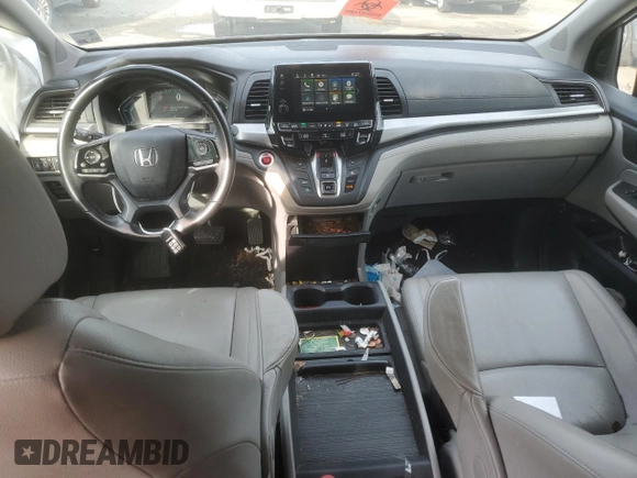 2018 Honda Odyssey EX-L with VIN 5FNRL6H74JB099282, listed as a Copart auction lot 55031025 with 137,359 mi miles and Salvage Title. Bid and sale history available at DreamBid. Image 8.