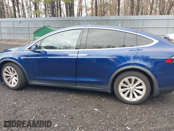 2016 Tesla Model X 70D with VIN 5YJXCBE20GF016173, listed as a IAAI auction lot 41809725 with 116,198 mi miles. Bid and sale history available at carsss.com. Image 14.