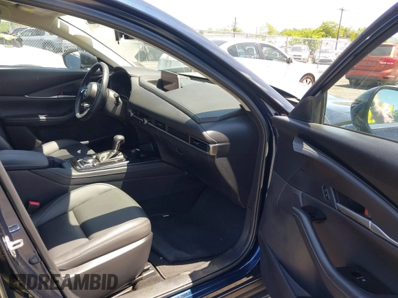 2024 Mazda CX-30 S Select Sport with VIN 3MVDMBBM2RM657781, listed as a IAAI auction lot 42297311 with 13,677 mi miles and . Bid and sale history available at DreamBid. Image 5.