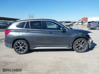 2020 BMW X1 xDrive28i with VIN WBXJG9C07L3L79276, listed as a IAAI auction lot 41377399 with 73,017 mi miles. Bid and sale history available at carsss.com. Image 13.