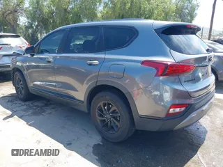 2019 Hyundai Santa Fe SE with VIN 5NMS23AD7KH009688, listed as a IAAI auction lot 41991686 with 77,942 mi miles and . Bid and sale history available at DreamBid. Image 3.