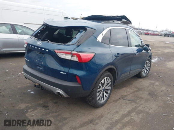 2020 Ford Escape Titanium with VIN 1FMCU9J98LUC00068, listed as a IAAI auction lot 41843755 with 42,525 mi miles and . Bid and sale history available at DreamBid. Image 4.