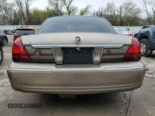 2006 Mercury Grand Marquis LS Premium z VIN 2MEHM75V46X655372, wystawiony jako Copart lot #54866655 z przebiegiem 140 863 mil mil oraz Nie do naprawy. Historia ofert i sprzedaży dostępna na DreamBid. Obrazek 6.