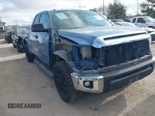 2019 Toyota Tundra SR with VIN 5TFRM5F19KX135013, listed as a IAAI auction lot 41469991 with 152,889 mi miles and . Bid and sale history available at DreamBid. Image 1.