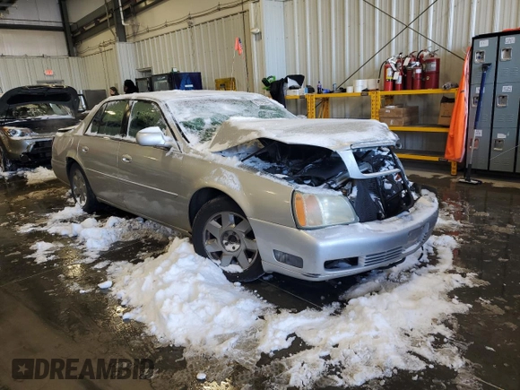 2002 Cadillac DeVille DTS with VIN 1G6KF57912U199809, listed as a Copart auction lot 87372504 with 154,663 mi miles and Salvage Title. Bid and sale history available at carsss.com. Image 4.